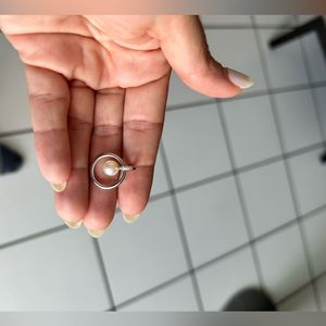 Pearl and white gold pendant